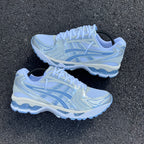 Asics Gel-Kayano 14 White Light Navy trainer – pair laid flat, top-down view